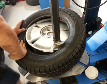 image of tire on mounting machine