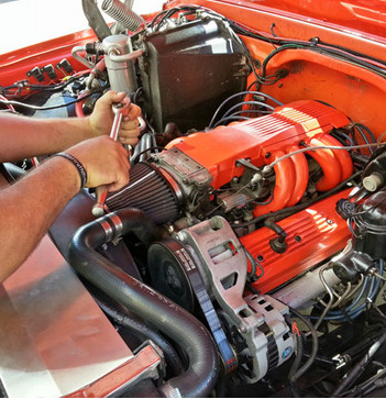 image of high performance engine in classic orange truck